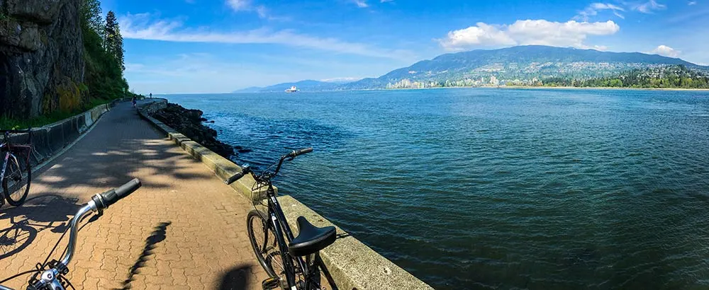 sea wall biking around stanley park in vancouver canada