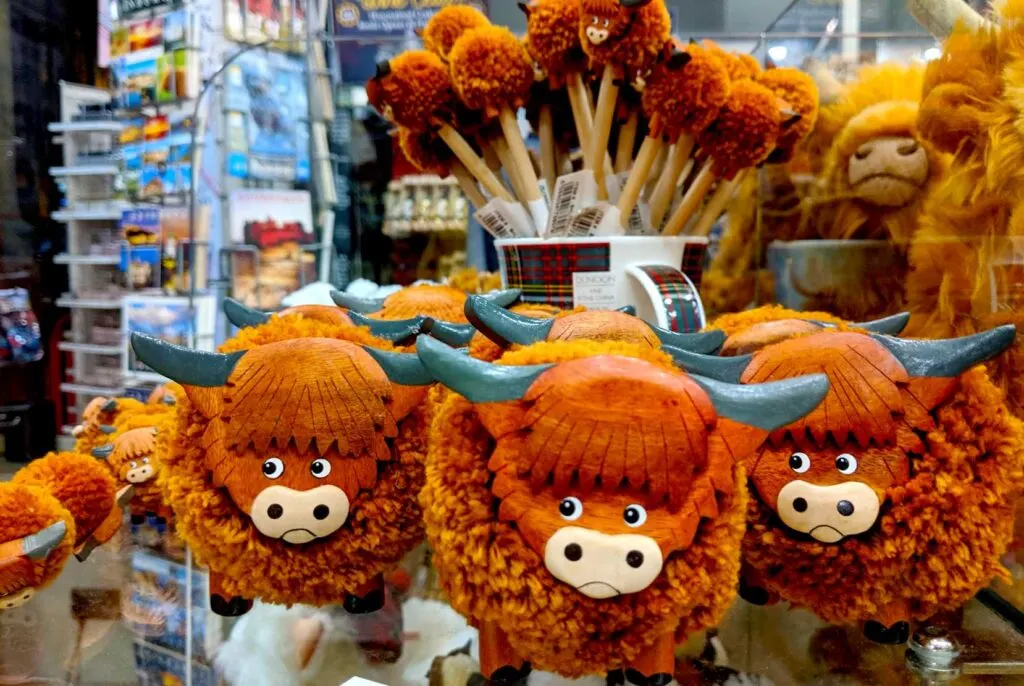 hair-coo-fluffy-figurine-with-hairy-cool-pencils-int-he-backgorund-at-a-souvenir-shop-in-scotland