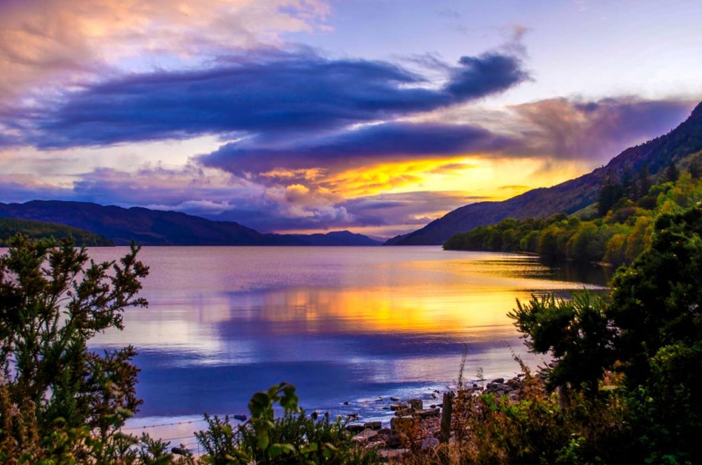sunset over loch ness vibrant purples and yellows