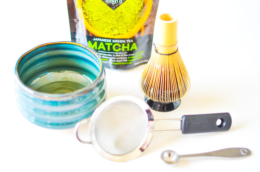 how to make matcha at home, what you'll need: a bamboo whisk, a mini sifter, a traditional matcha bowl, a stainless steel tsp, and a bag of matcha powder