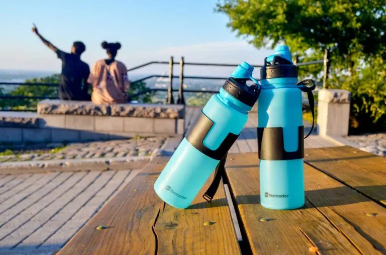 nomader-collapsible-water-bottle-on-bench-montreal-skyline