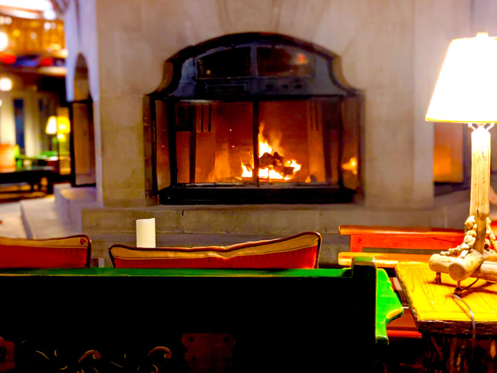 warming-up-by-the-fire-in-the-lobby-chateau-montebello