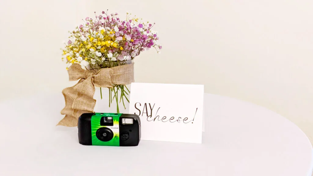 centre-pieces-and-disposable-cameras-for-wedding-ceremony