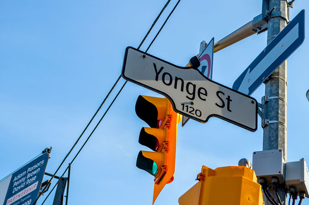 a closeup of yonge st sign in toronto ontario