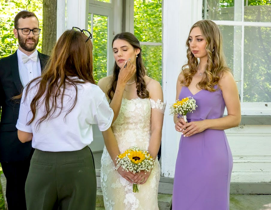 getting-makeup-retouched-wedding-day