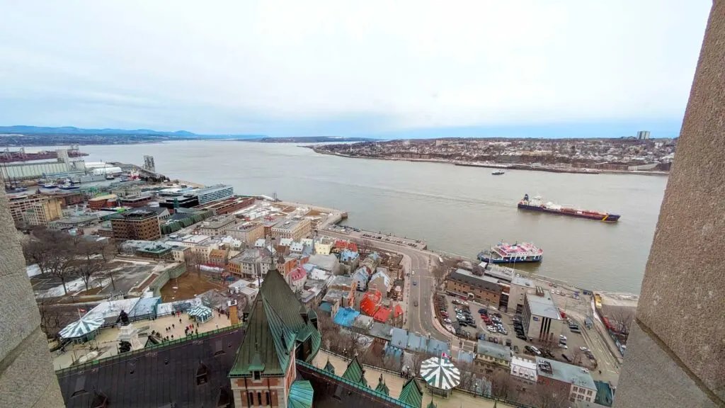 aerial-view-of-quebec-city-below-the-city-with-the-st-lawerence-river-and-moutnains-in-the-backgorund