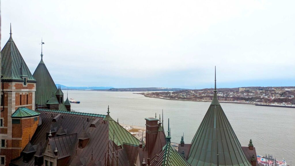quebec-city-view-of-the-st-lawerence-from-inside-the-chateau-frontenac-with-all-the-castle-architecture-in-the-foreground
