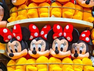 A-wall-filled-with-minnie-mouse-stuffies-for-souvenirs-from-disney-world-featured-image
