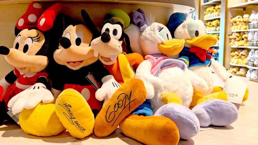 example-of-the-perfect-disney-world-souvenir-insted-of-the-autograph-books--classic-disney-characters-lined-up-you-can-see-the-bottom-of-micky-and-goofys-feet-with-their-autograph-on-them-