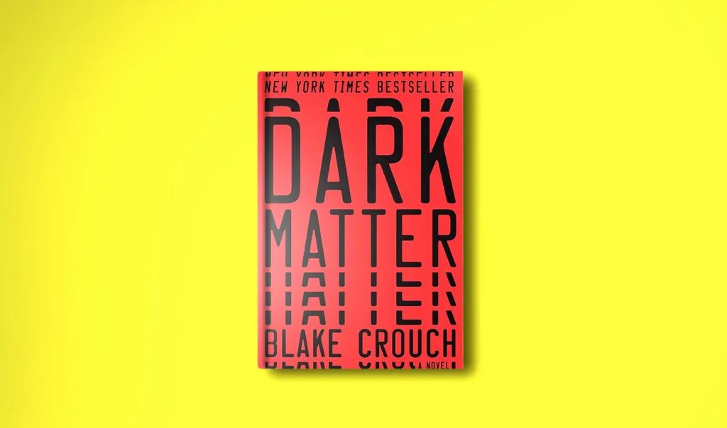 a bright yellow background with a book in the middle: dark matter by blake crouch. It's a red bakcground with the title and author in larger black letters