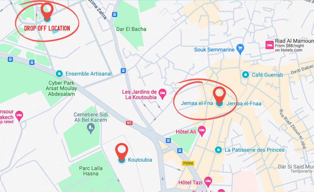 a screenshot of google maps with added pin drop locations. In the top left corner is the pin dropped in a random area, it's circle in red and written below is: the drop off location. Towards the centre of the map is a circle pin drop with Jemaa El-Fna