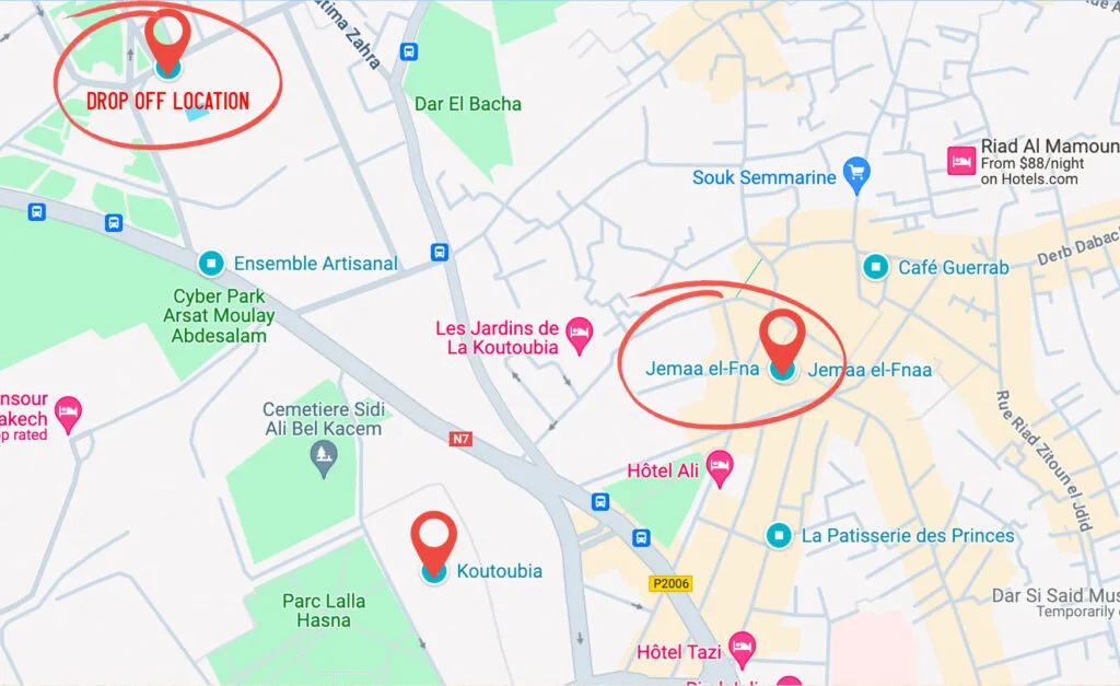 a screenshot of google maps with added pin drop locations. In the top left corner is the pin dropped in a random area, it's circle in red and written below is: the drop off location. Towards the centre of the map is a circle pin drop with Jemaa El-Fna