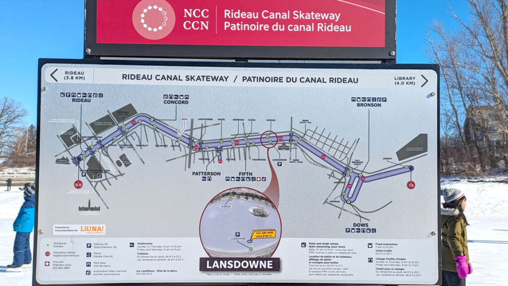 a closeup of an information sign along the rideau canal in ottawa for skating. It's highlighting where you are, at Lansdowne, and you can see every entry point along the canal by small green dots on both sides of the ice.